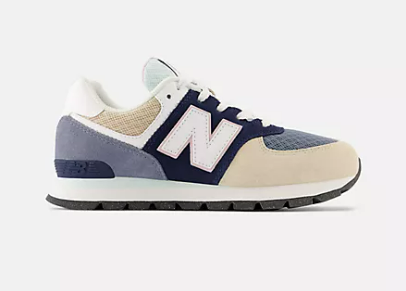 Sneaker with laces and the letter N on the side blue and cream accents